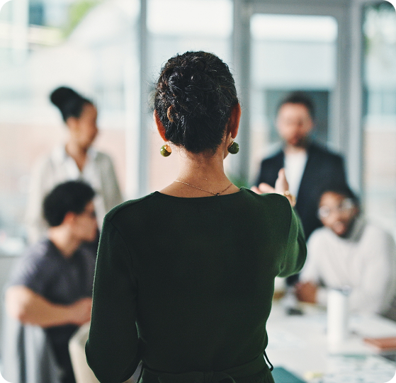 Woman presenting in front of a group